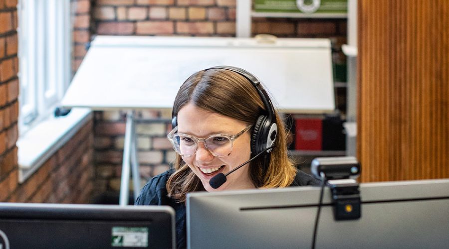 Person using business broadband to work)