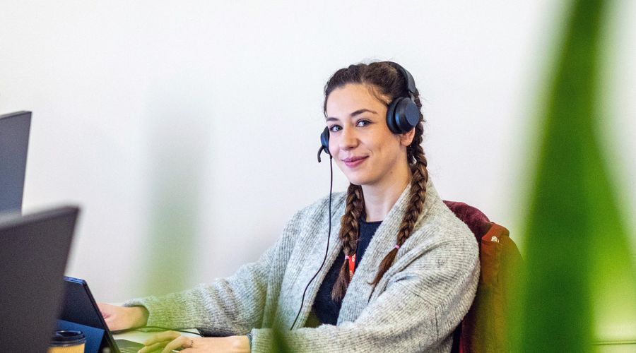 Worker researching whether business broadband is better than residential 